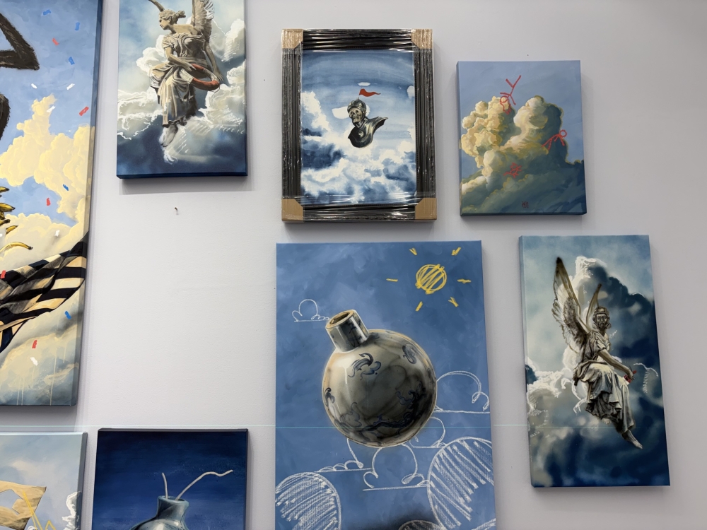 More than blue skies and puffy clouds at the Up In The Air exhibition by Thomas Powell. — Picture by Opalyn Mok