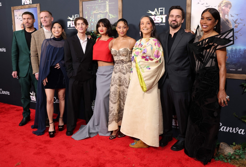(From left) ‘Wildwood’ director Travis Knight and voice cast Marc Evan Jackson, Awkwafina, Jacob Tremblay, Peyton Elizabeth Lee, Amandla Stenberg, Tantoo Cardinal, Jake Johnson and Angela Bassett at the AFI Fest opening-night premiere of the show at the TCL Chinese Theatre in Los Angeles on October 21, 2026. — AFP pic