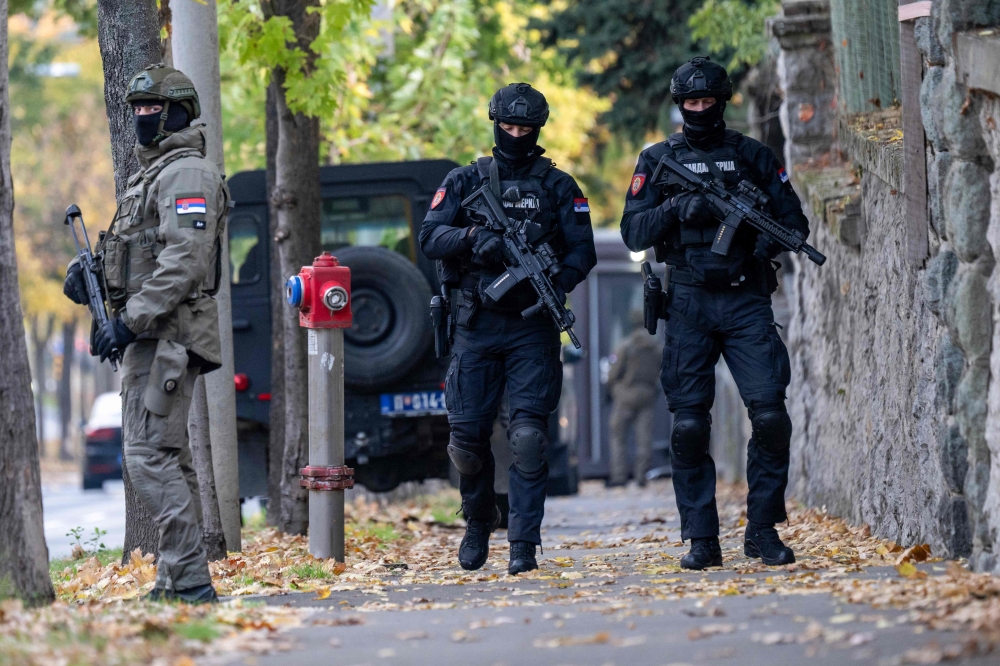 Members of Serbia’s Gendarmerie stand guard at the entrance to the Israeli embassy in Belgrade on October 28, 2026, after a police officer stationed at the mission was attacked with two knives shortly after midnight. — AFP pic