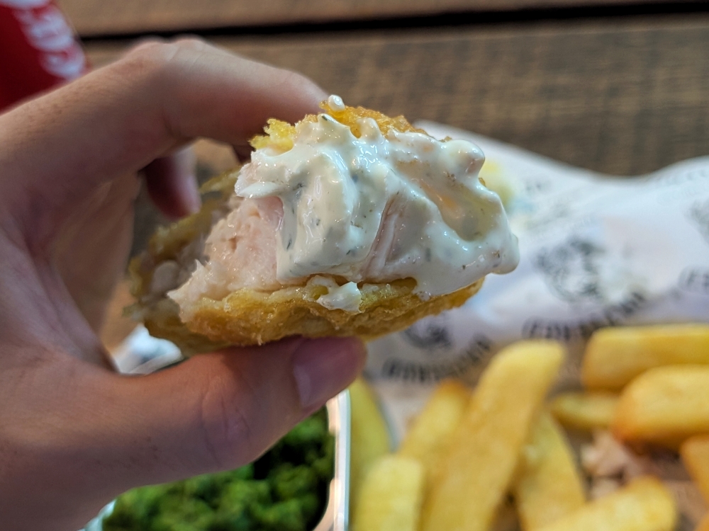 Moist flesh and crispy batter make for an enjoyable fried fish experience, but the tartar sauce could be sharper in my book. — Picture by Ethan Lau
