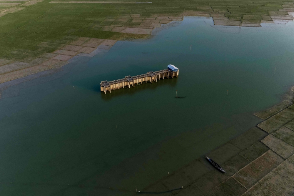 This aerial photograph taken on October 13, 2026 shows a water intake tower built close to a dam along the Padma river at Ujirpur, near the Bangladesh-India frontier in Bangladesh’s Rajshahi division. Bangladesh said India had not responded to its request to negotiate a treaty renewal. — AFP pic