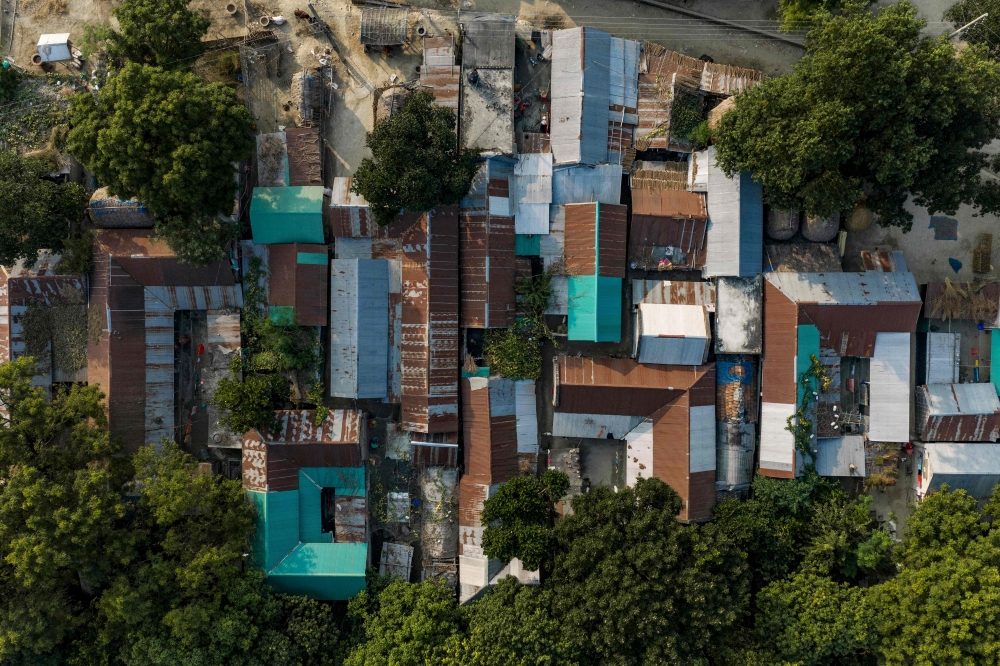 This aerial photograph taken on October 12, 2026 shows a settlement of climate-displaced people following the erosion of Padma river at Namo Jagannathpur village, near the Bangladesh-India frontier in Bangladesh’s Rajshahi division. — AFP pic