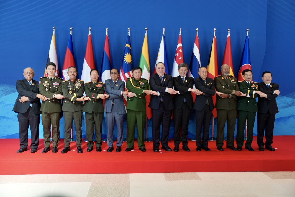 Asean Defence Ministers’ pose for the symbolic Asean handshake at the 20th Asean Defence Ministers’ Meeting in Cebu, the Philippines. — Picture courtesy of Ministry of Defence (Mindef)