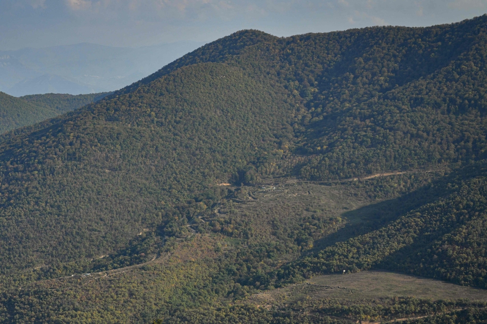 A view shows Azeri military sites in forests of the Shikahogh nature reserve as seen from the vicinity of the Armenian village of Srashen October 22, 2026. — AFP pic