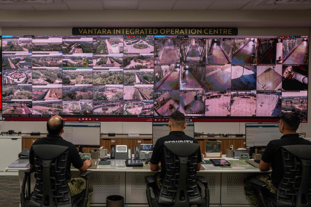 Security staff watch monitors inside the central operation centre at the Vantara Wildlife Rescue and Conservation Centre in Jamnagar September 25, 2026. — AFP pic