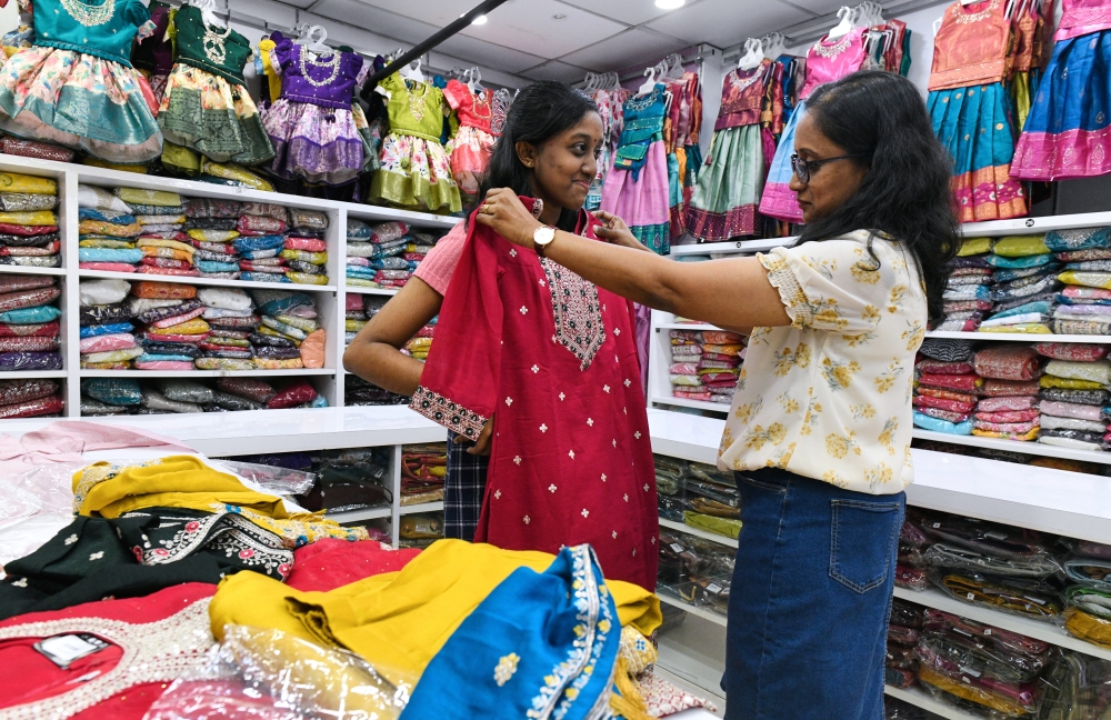 Colourful ‘saris’, ‘kurtas’ and festive accessories are among the goods attracting shoppers ahead of the Festival of Lights. — Bernama pic