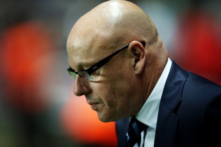 Leeds Uniteds former manager Brian McDermott looks on during the League Cup football match between Newcastle United and Leeds United at St James's Park in Newcastle on September 25, 2013. u00e2u20acu201d AFP pic