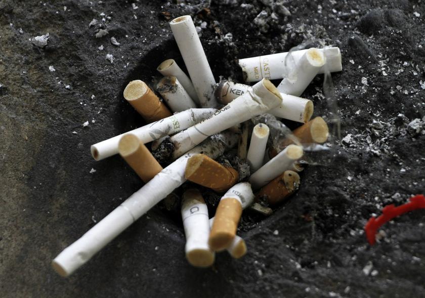 Cigarette butts in an ashtray in Los Angeles, California, in this file photo from May 31, 2012. Globally, lung cancer was the biggest killer with 19.4 per cent of the total, followed by cancer of the liver with 9.1 per cent and stomach with 8.8 per cent. 