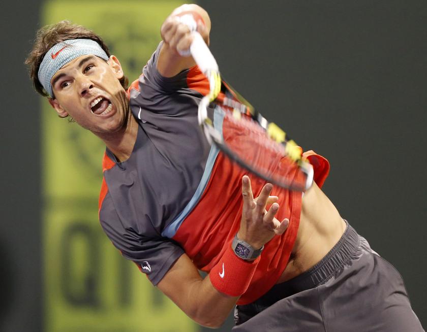 Rafael Nadal of Spain serves to Peter Gojowczyk of Germany during their Qatar Open tennis match in Doha January 3, 2014.  u00e2u20acu201d Reuters pic