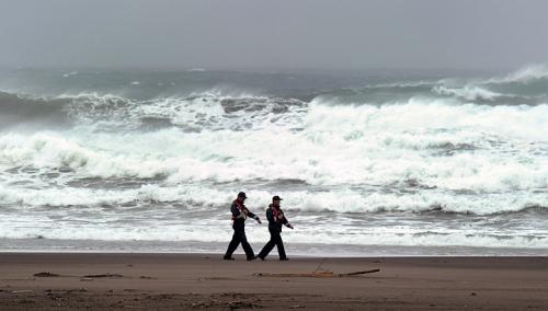 Coastguards mobilised to search for Tseng found him lying on the beach around noon yesterday. u00e2u20acu201d AFP pic