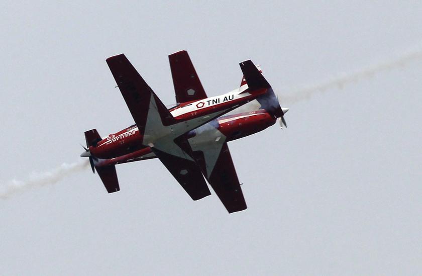 Indonesia Air Force's Jupiter Aerobatic team performs a manoeuvre during an aerial display ahead of the Singapore Airshow February 9, 2014. u00e2u20acu201d Reuters pic