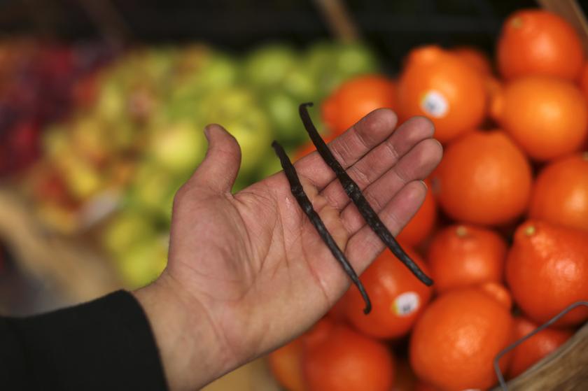 A man holds whole vanilla beans at a grocery market in San Francisco, California February 7, 2014. u00e2u20acu201d Reuters pic