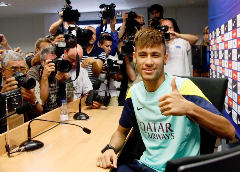 Barcelona's Neymar is surrounded by journalists before his first news conference after a training session at Ciutat Esportiva Joan Gamper in Sant Joan Despi near Barcelona, August 1, 2013. u00e2u20acu201d Reuters pic