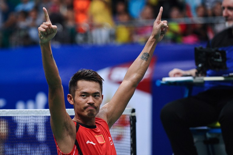 China's Lin Dan celebrates after winning his men's singles final against Malaysia's Lee Chong Wei at World Badminton Championships in Guangzhou, south China's Guangdong province on August 11, 2013. u00e2u20acu201d AFP pic