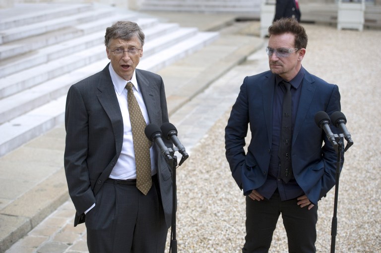 Irish musician and humanitarian activist Bono (right) and Microsoft co-founder turned global philanthropist Bill Gates speak to the press after a meeting with French President at the Elysee Palace in  Paris, October 10, 2012.u00e2u20acu2022 AFP pic