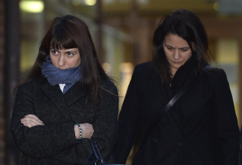 Francesca (left) and Elisabetta Grillo leave Isleworth Crown Court in west London November 27, 2013.  u00e2u20acu201d Reuters pic