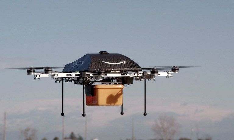 This undated handout photo released by Amazon on December 1, 2013 shows an u00e2u20acu02dcoctocopteru00e2u20acu2122 mini-drone that would be used to fly small packages to consumers. u00e2u20acu201d AFP pic/Amazon pic