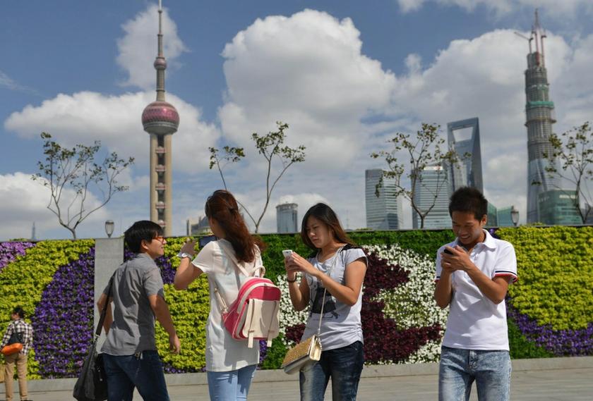 Meituan helps more than four million merchants hawk everything from food delivery to apartment rentals and travel packages to a user base about the size of the US population. — AFP pic