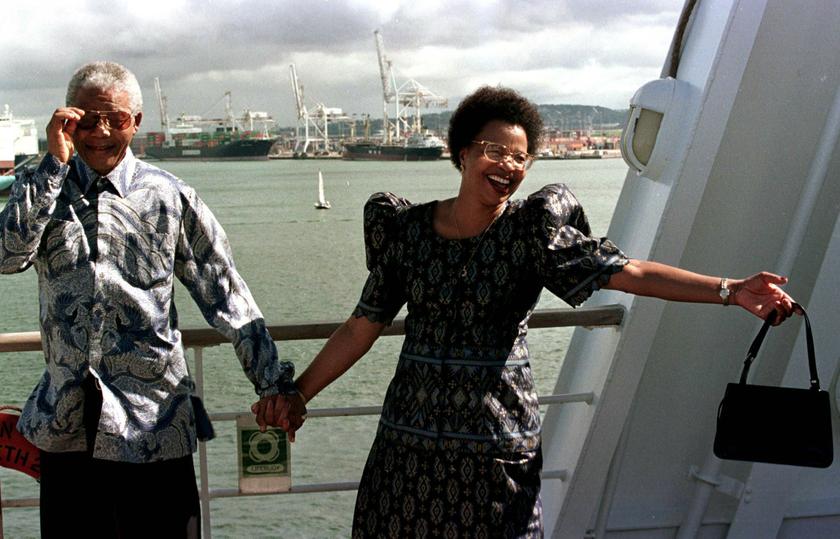 South African President Nelson Mandela (left) adjusts his sunglasses as he and Graca Michel set sail aboard the QE II cruise ship in Durban harbor, for Cape Town, in this file picture taken March 29, 1998. u00e2u20acu201d Reuters pic