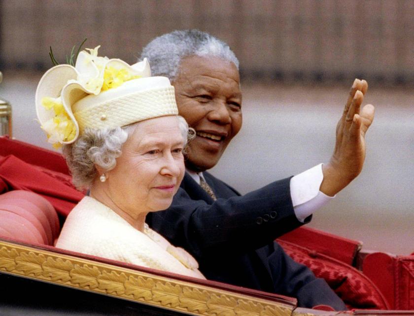 South Africa's President Nelson Mandela and Britain's Queen Elizabeth ride in a carriage outside Buckingham Palace on the first day of a state visit to Britain, in this July 9, 1996 file photo. u00e2u20acu201d Reuters pic