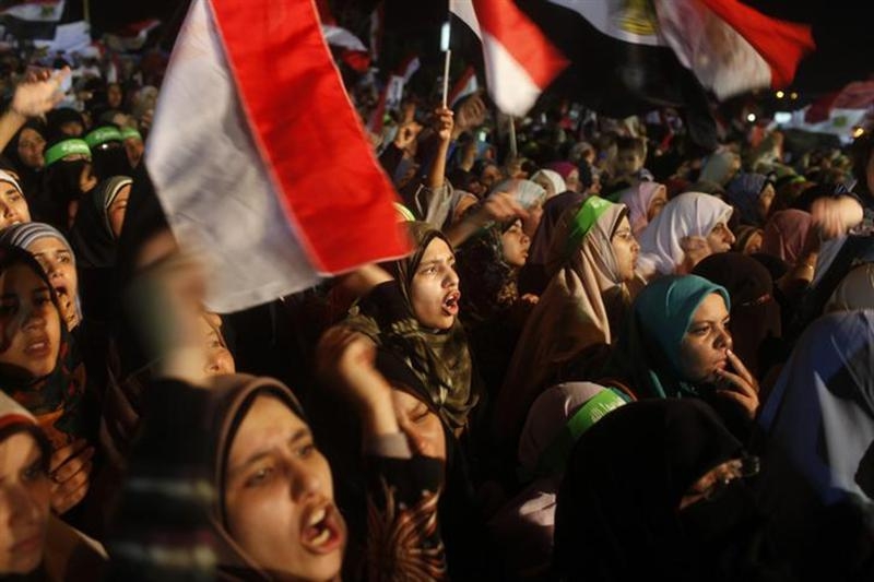 Supporters of Egypt's deposed President Mohamed Mursi shout slogans as they continue their sit-in outside the Rabaa Adawiya mosque, east of Cairo July 11, 2013. u00e2u20acu201d Reuters pic