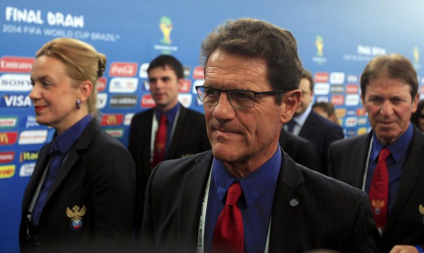 Russia's coach Fabio Capello (centre) leads the country's delegation as they arrive for the draw for the 2014 World Cup at the Costa do Sauipe resort in Sao Joao da Mata, Bahia state, December 6, 2013.  u00e2u20acu201d Reuters pic