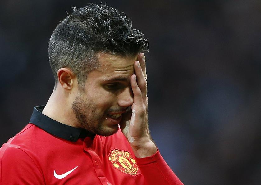 Manchester United's Robin van Persie reacts after losing to Newcastle United in their English Premier League football match at Old Trafford in Manchester, northern England, December 7, 2013. u00e2u20acu201d Reuters pic