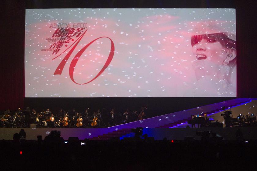 A screen shows an image of late Hong Kong pop star Anita Mui during a concert marking the tenth anniversary of her death in Hong Kong December 31, 2013. u00e2u20acu201d Reuters pic