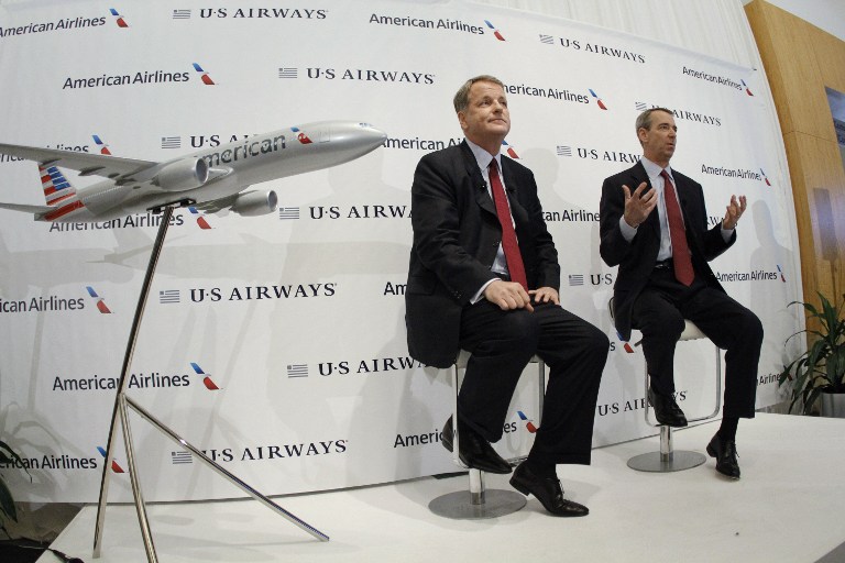 Doug Parker (left), Chairman and CEO of US Airways, and Thomas Horton, Chairman, President and Chief Executive Officer of American Airlines speak during a news conference to announce the merger of the two airlines February 14, 2013 in Texas. u00e2u20acu201d AFP pic