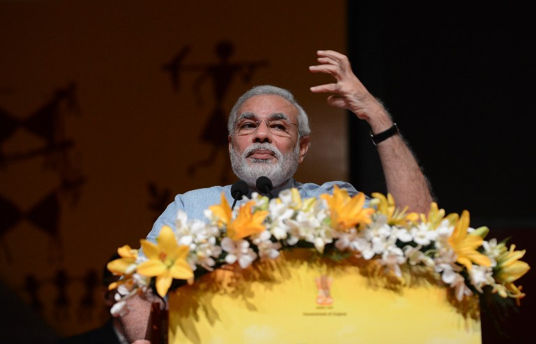 Narendra Modi speaks during the Vibrant Gujarat 2013, Global Agriculture summit at Mahatma Mandir in Gandhinagar, some 30 kms from Ahmedabad on September 9, 2013.  u00e2u20acu201d AFP pic