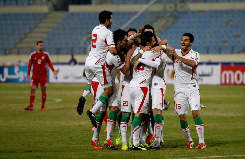 Iran's national football team celebrate after scoring a goal against Lebanon during their AFC Asian Cup 2015 qualifying match in Beirut, November 19, 2013. The country's qualification for the World Cup has been greeted with joy. u00e2u20acu201d Reuters pic