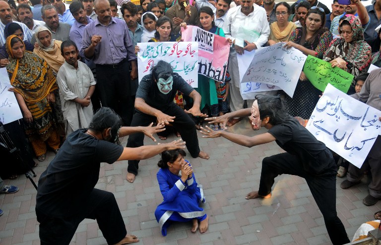 Pakistani workers from NGOs perform during an anti-rape protest in Lahore on September 14, 2013. u00e2u20acu201d Reuters pic
