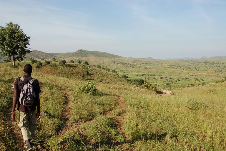 This picture taken in October 2008 shows a local guide walking in the Mandara mountains,not far from the border with Nigeria. A French priest was kidnapped overnight in the north of Cameroon near the border with Nigeria. u00e2u20acu201d Reuters pic