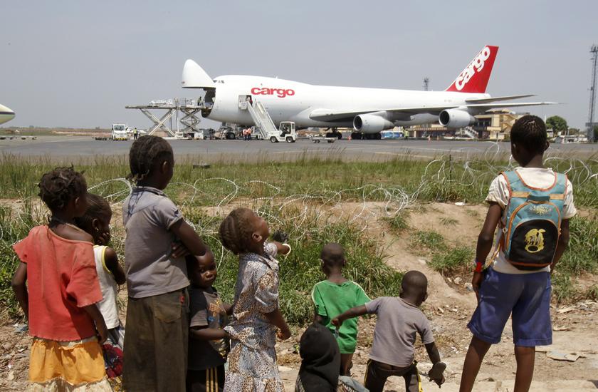 A humanitarian plane of the World Food Program (WFP) unloads sacks of cereal at Mpoko international airport in Bangui, Central African Republic, which is located near a camp for displaced people, February 14, 2014. u00e2u20acu2022 Reuters pic