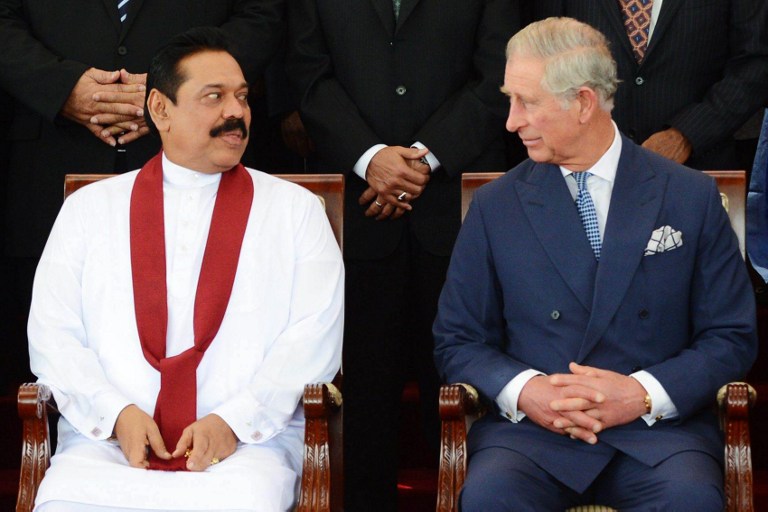 Sri Lankan President Mahindra Rajapakse (left) and Britain's Prince Charles sit in front of other Heads of State belonging to the Commonwealth during an official portrait photograph at the CHOGM summit in Colombo on November 15, 2013. u00e2u20acu201d AFP pic