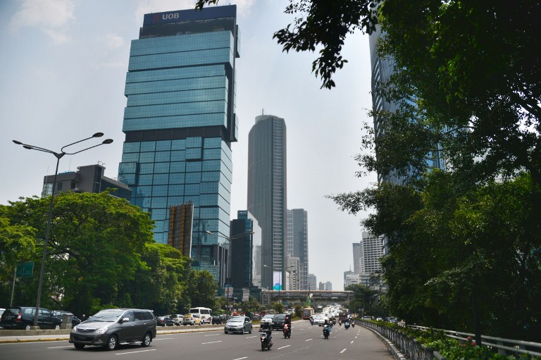 File picture shows motorists commuting through Jakarta's business district on August 2, 2013. u00e2u20acu201d AFP pic