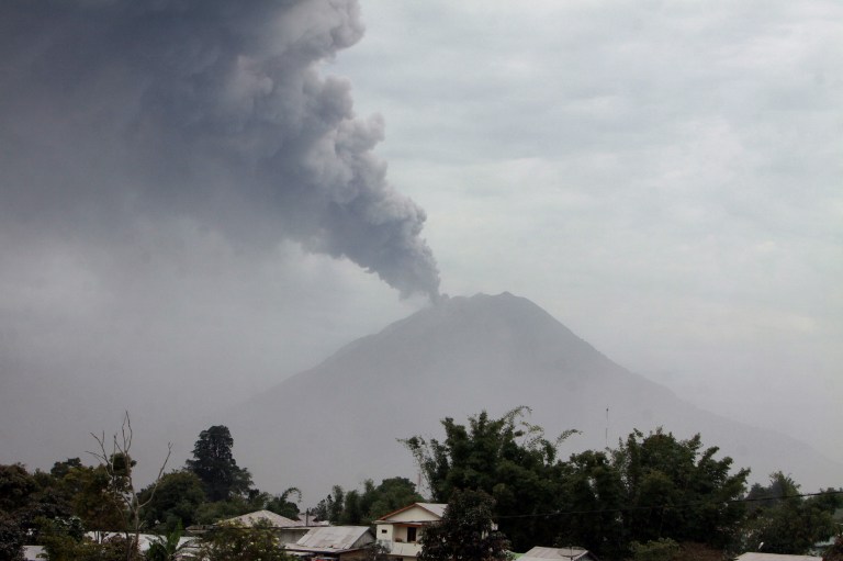 A giant column of ash clouds rise from the crater of the Mount Sinabung volcano during a fresh eruption on September 17, 2013. - AFP pic