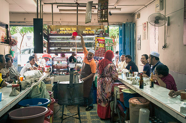 Mohd Rudin Sulaimeen, the 71-year-old proprietor of Kedai Kopi Din Tokyo in Kota Bahru, loves to ask his regulars, “Boss, berapa kali tarik?”. – Picture courtesy of Kenny Loh
