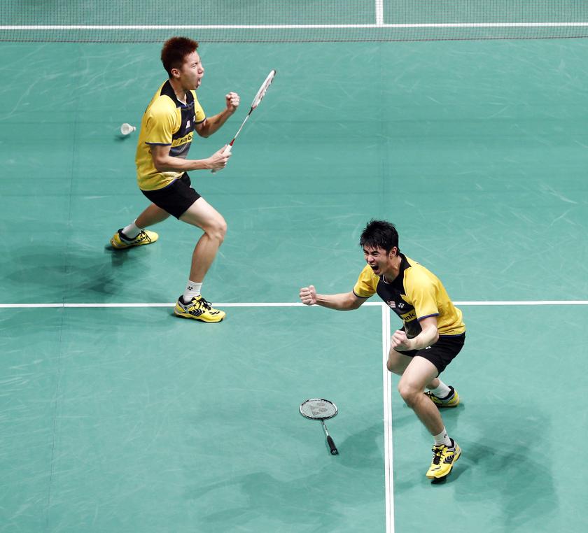 Goh V Shem and Lim Kim Wah (right) of Malaysia celebrate after their men's doubles final match against Chai Biao and Hong Wei of China at the Malaysian Open Super Series 2014 badminton tournament in Kuala Lumpur January 19, 2014. u00e2u20acu201d Reuters pic