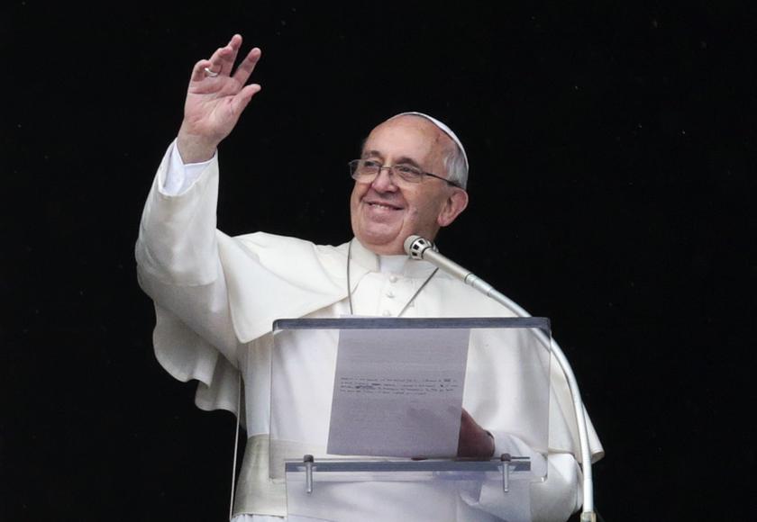 Pope Francis blesses faithful during his Sunday Angelus prayer in Saint Peter's square at the Vatican January 19, 2014.  u00e2u20acu201d Reuters pic