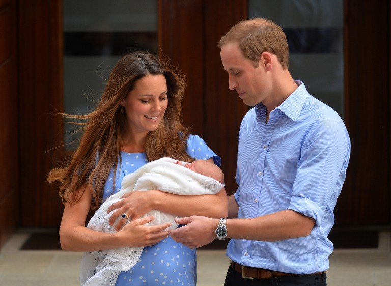 Prince William, Duke of Cambridge, and Catherine, Duchess of Cambridge show their new-born baby boy, Prince George of Cambridge, to the world's media outside the Lindo Wing of St Mary's Hospital in London on July 23, 2013. u00e2u20acu201d AFP pic