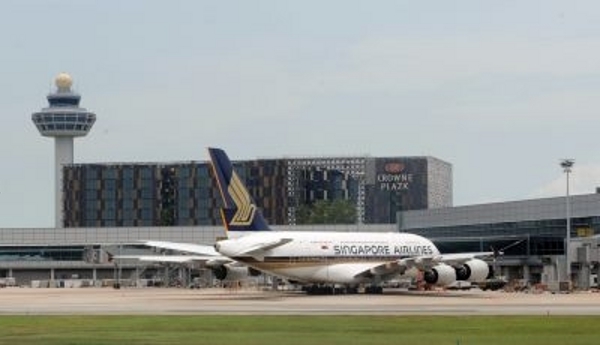 A Singapore Airlines A380 parked on the tarmac at the Changi International Airport. u00e2u20acu201d AFP-Relaxnews pic