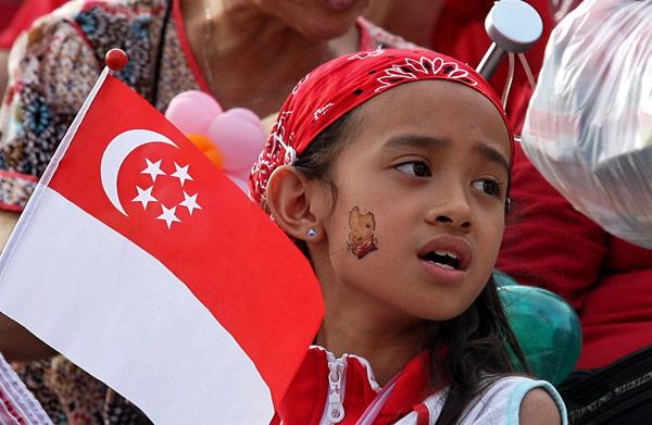 A young local artist has touched a raw nerve in Singapore after she posted a YouTube video labelling Singaporeans as u00e2u20acu02dcsubmissiveu00e2u20acu2122 and attacking the city-state's education system for stifling creativity. u00e2u20acu201d AFP pic