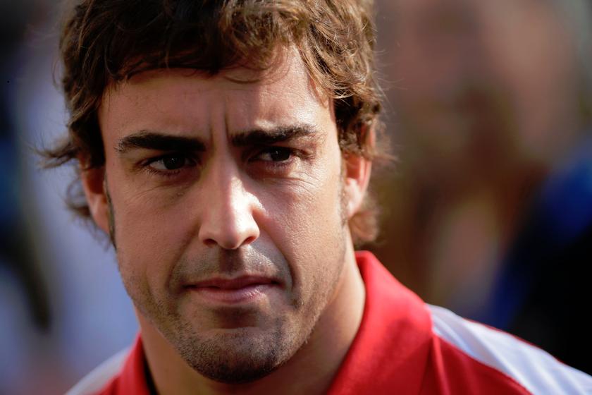 Ferrari Formula One driver Fernando Alonso of Spain listens to a question during a television interview at the paddock ahead of the Singapore F1 Grand Prix September 19, 2013. u00e2u20acu201d Reuters pic
