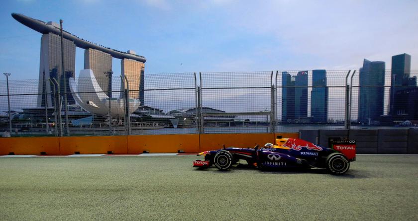  Red Bull Formula One driver Sebastian Vettel of Germany drives during the first practice session of the Singapore F1 Grand Prix at the Marina Bay street circuit in Singapore September 20, 2013. u00e2u20acu201d Reuters pic
