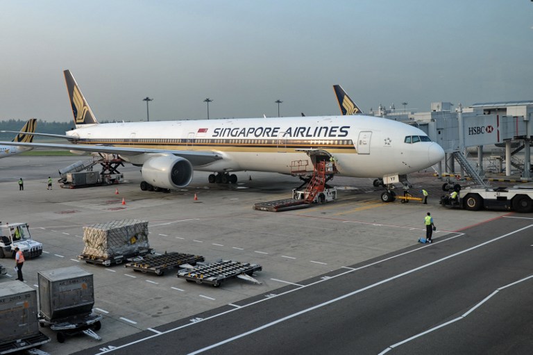 A Singapore Airlines (SIA) Boeing 777-312 is seen parked at the Changi International airport terminal in Singapore on June 28, 2013. u00e2u20acu201d AFP pic