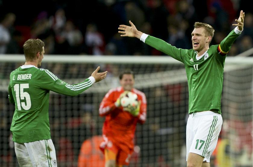 Germany's Lars Bender (left) and Per Mertesacker celebrate after winning their international friendly football match against England at Wembley Stadium in London November 19, 2013. u00e2u20acu201d Reuters pic
