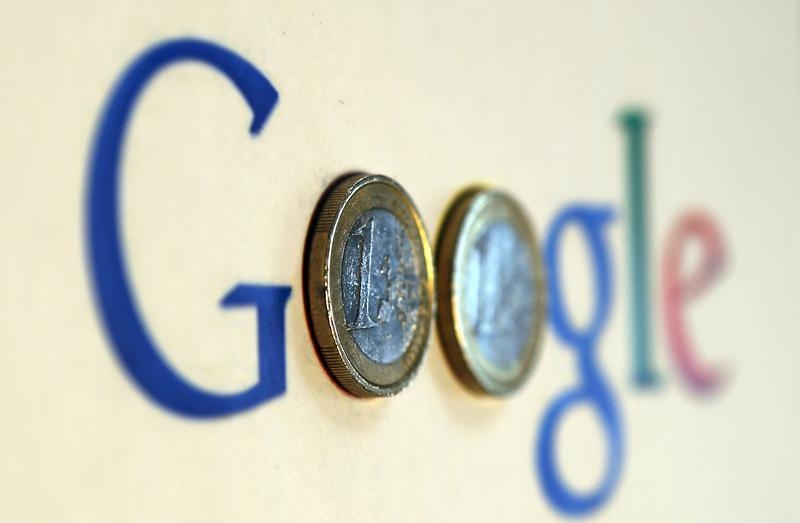 An illustration picture shows a Google logo with two one Euro coins, taken in Munich January 15, 2013. u00e2u20acu201d Reuters pic