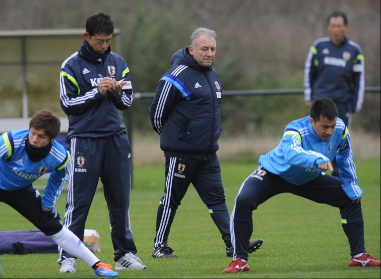 Japan's head coach Alberto Zaccheroni (centre) leads his team's training session at the Fenix Stadium, on November 12, 2013 in Genk, Belgium. He said the Asian champions will be based in cooler Itu outside Sao Paulo during the World Cup. u00e2u20acu201d AFP pic