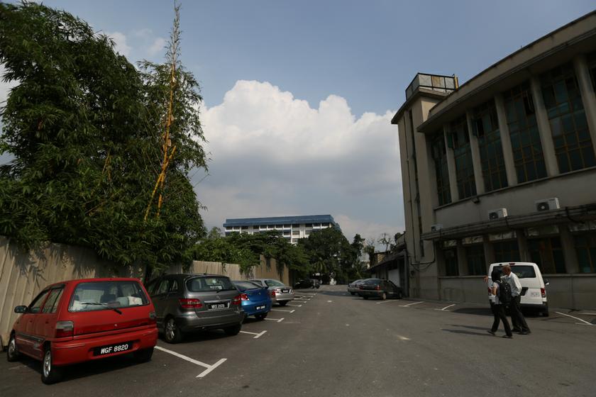 PNB plans to convert the thin strip of car-park space lying between Chin Woo Stadium and the firm's land into a 6m-wide access road despite the  association's objection.